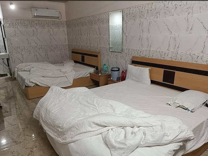 Comfortable dharamshala room at the tirth
